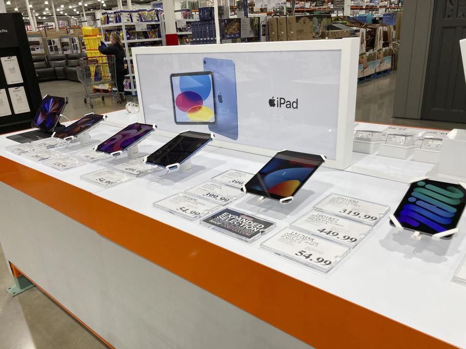 File - Apple iPads are displayed at a Costco warehouse on Monday, Feb. 21, 2023, in Sheridan, Colo. On Wednesday, the Labor Department reports on U.S. consumer prices for March. (AP Photo/David Zalubowski, File)