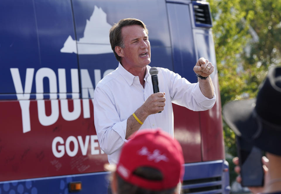 FILE - Virginia Gov. Glenn Youngkin addresses the crowd during an early voting rally, Sept. 21, 2023, in Petersburg, Va. Conjecture that Youngkin, who is set to host a major donor retreat Tuesday, Oct. 17, and Wednesday, Oct. 18, might make a late entry into the 2024 presidential race has only grown since his victory nearly two years ago and could further escalate after next month’s high-stakes legislative elections, where he’s aiming for a GOP sweep. (AP Photo/Steve Helber, File)