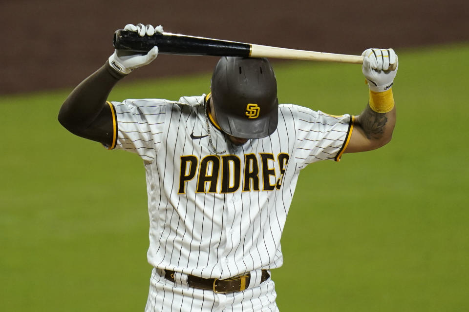 San Diego Padres' Tommy Pham reacts after striking out during the sixth inning of the team's baseball game against the Los Angeles Angels, Tuesday, Sept. 22, 2020, in San Diego. (AP Photo/Gregory Bull)