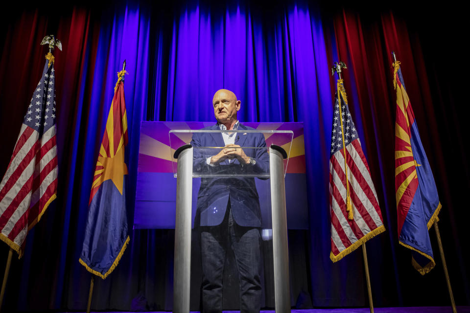 Sen. Mark Kelly, D-Ariz., addresses supporters at an election night event in Tucson, Ariz., Tuesday, Nov. 8, 2022. (AP Photo/Alberto Mariani)