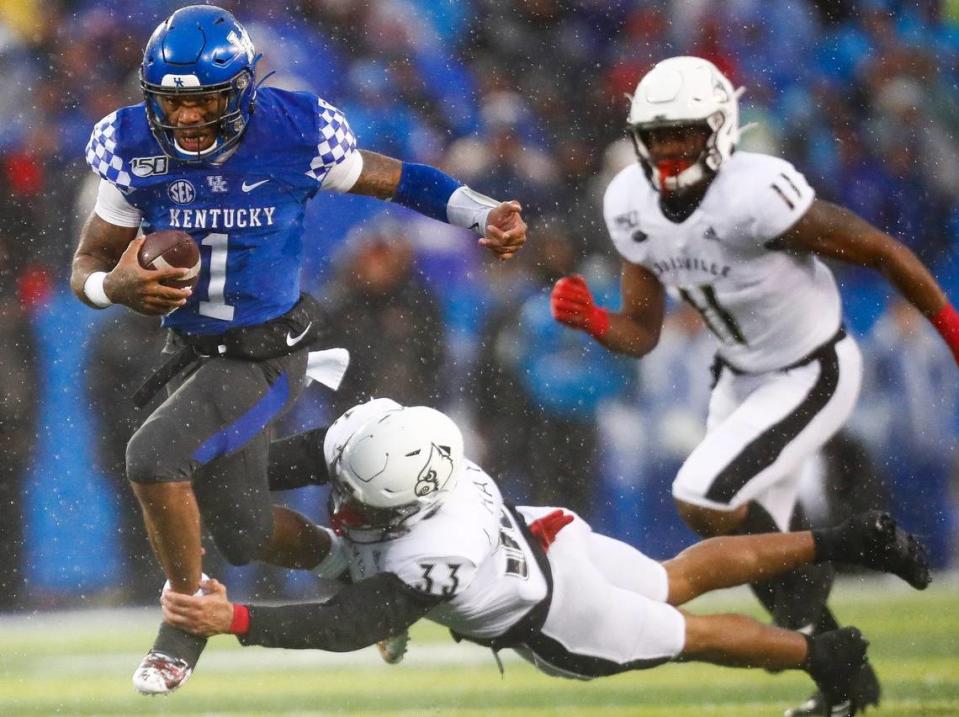 In a game played in a driving rain storm, Kentucky wide receiver-turned-quarterback Lynn Bowden gashed the Louisville run defense for 284 yards and four touchdowns in a 45-13 UK victory over U of L in 2019.