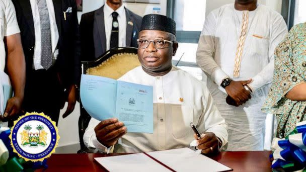 PHOTO: Sierra Leone’s President Julius Maada Bio signs into law the Gender Equality and Women’s Empowerment Act during a ceremony in Freetown on Jan. 19, 2023. (President Julius Maada Bio/Twitter)