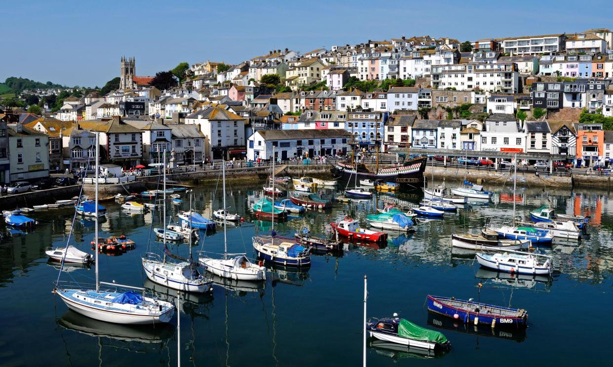 <span>High tide at the harbour in Brixham.</span><span>Photograph: Kevin Britland/Alamy</span>