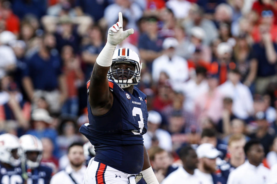 Auburn defensive end Marlon Davidson (3) reacts after a stop against Alabama during the first half of an NCAA college football game Saturday, Nov. 30, 2019, in Auburn, Ala. (AP Photo/Butch Dill)