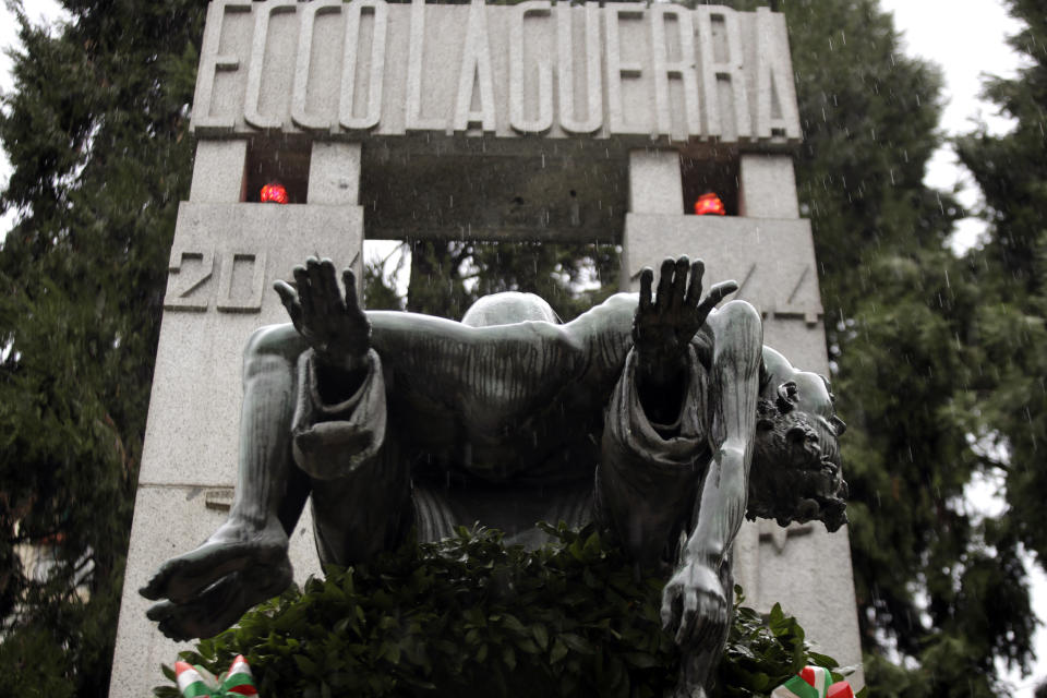 The bronze ossuary monument entitled 'Ecco La Guerra', (Here is War) dedicated to the 'Little Martyrs of Gorla', in memory of a World War II bombing raid on Oct. 20 1944 is pictured in Milan, Italy, Sunday, Oct. 20, 2019. Milan's mayor Giuseppe Sala, following a Mass Sunday for the 75th anniversary of the raid, asked U.S. authorities to apologize for a World War II bombing raid that killed 184 elementary school children. (AP Photo/Luca Bruno)