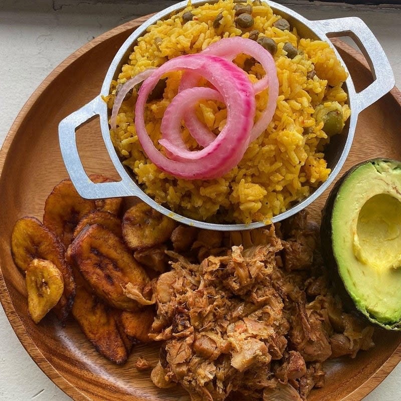 Photo of Jackfruit "Vernil with a side of plantains, avocado, and rice