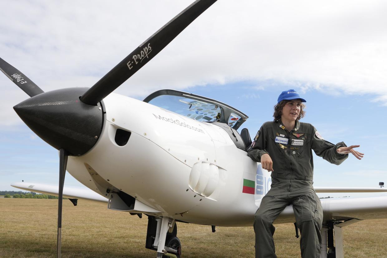 Mack Rutherford talks to the media in Belgium on Tuesday, shortly before completing his circumnavigation of the globe.