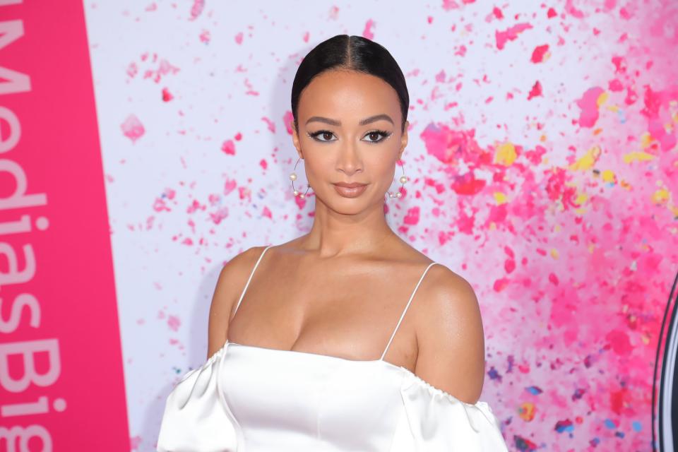 Draya Michele poses at an event