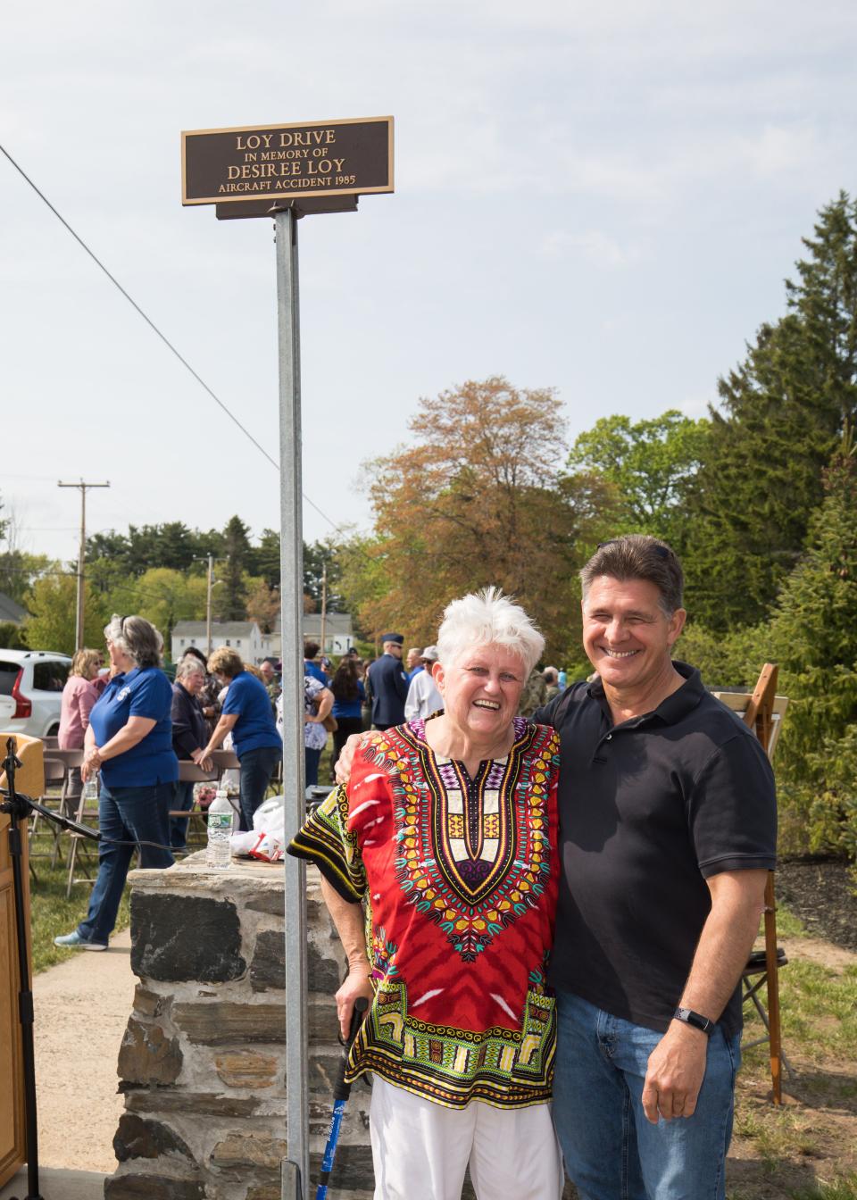 Shelia Nudd poses with developer Michael Green of Green and Company.  Nudd was instrumental in naming the new cul-de-sac in Hampton in honor of Sgt. Desiree Loy.