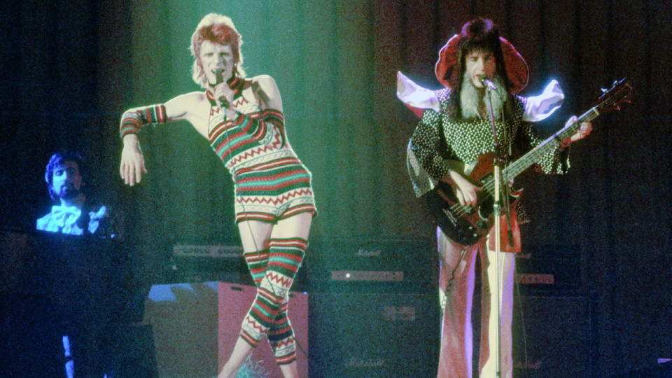 LOS ANGELES - 1973: Musician David Bowie performs onstage with bass player Trevor Bolder (1950-2013) during his 