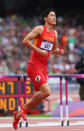 Xiang Liu of China hops on the track after getting injured in the Men's 110m Hurdles Round 1 Heats on Day 11 of the London 2012 Olympic Games at Olympic Stadium on August 7, 2012 in London, England. (Photo by Alexander Hassenstein/Getty Images)