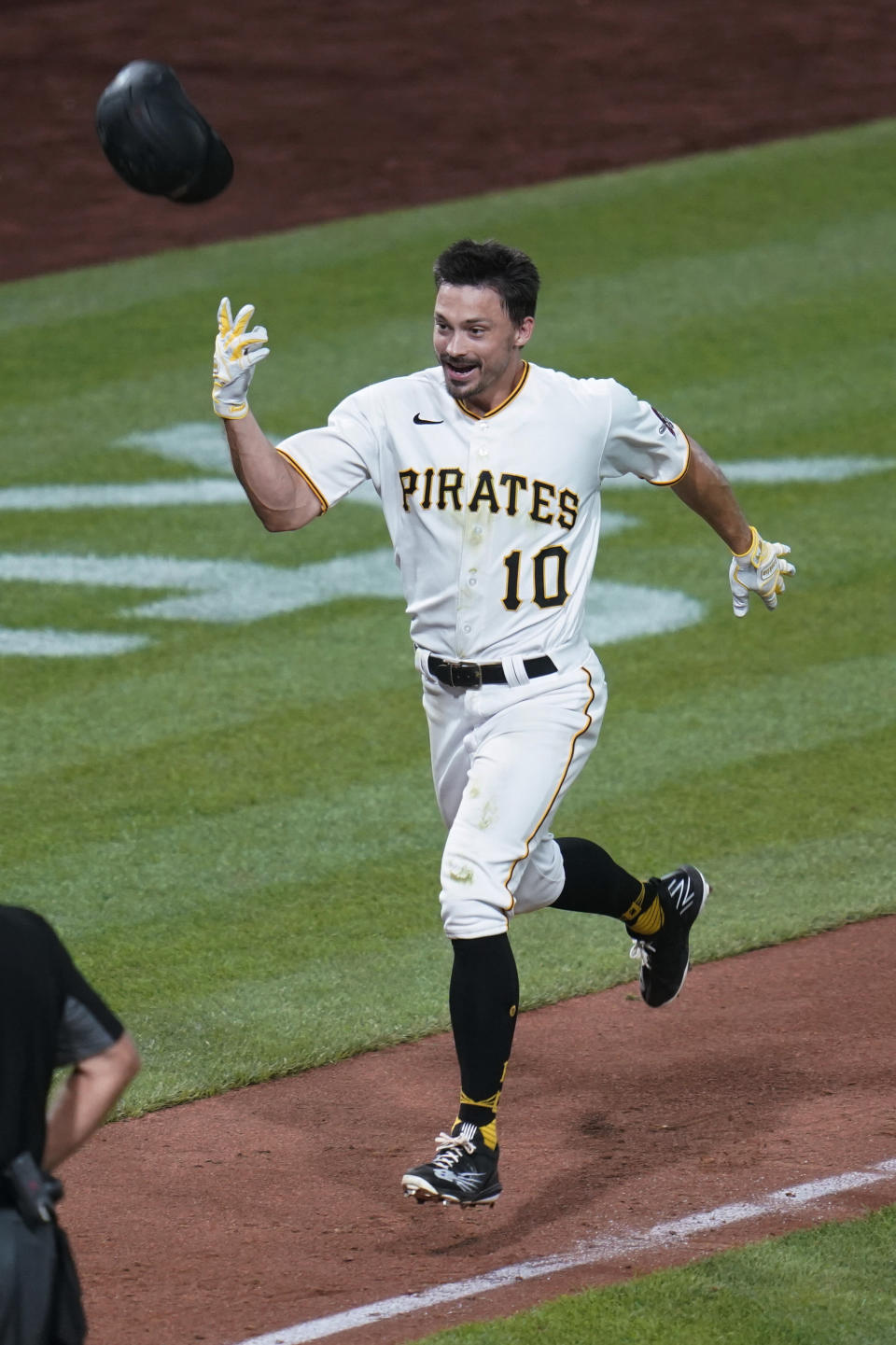 Pittsburgh Pirates' Bryan Reynolds celebrates hitting a game-ending home run against the Milwaukee Brewers in the ninth inning of a baseball game against the Milwaukee Brewers, Wednesday, Aug. 3, 2022, in Pittsburgh. The Pirates won 8-7. (AP Photo/Keith Srakocic)