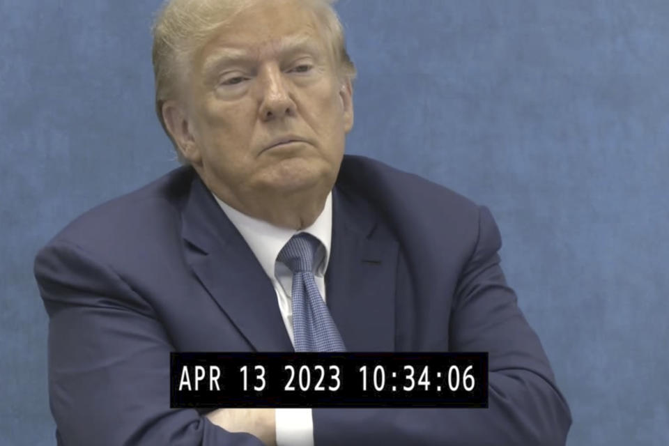 In this image taken from from video made public by the Office of the New York State Attorney General on Friday, Jan. 19, 2024, former President Donald Trump sits for a deposition on April, 13, 2023, where the former president came face-to-face with the New York State Attorney General Letitia James at her Manhattan, New York Office. (Office of the New York State Attorney General via AP)