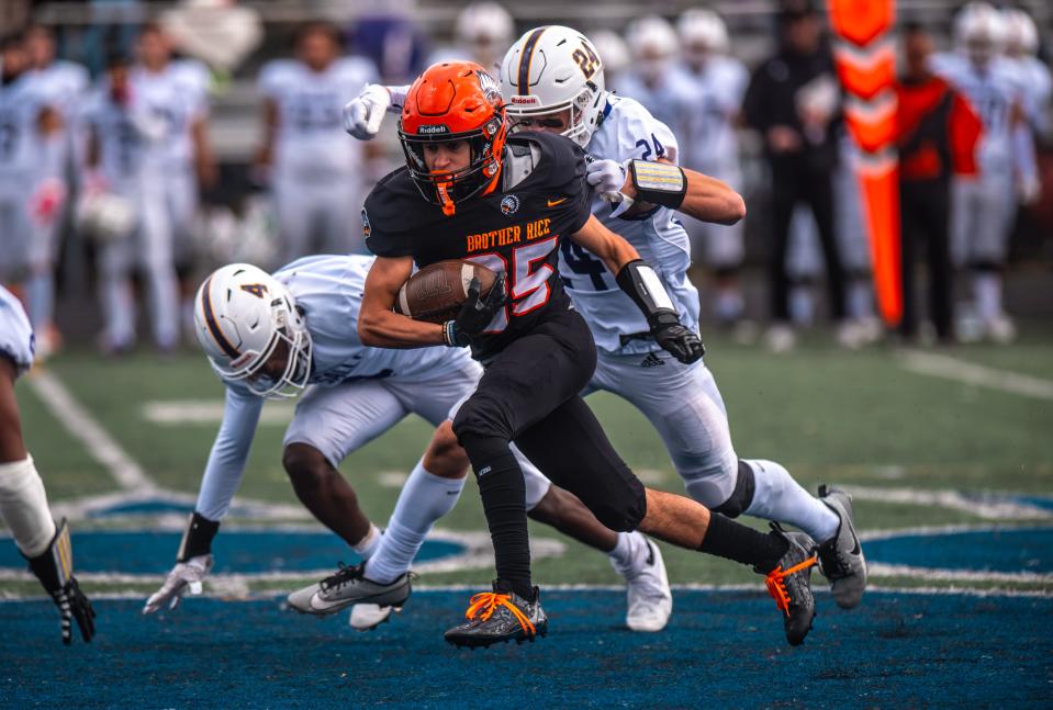 Brother Rice senior Sebastian Abro rushes during a Catholic League-Central football game against Warren DeLaSalle on Saturday, Oct. 7, 2023, at Hurley Field in Berkley.
