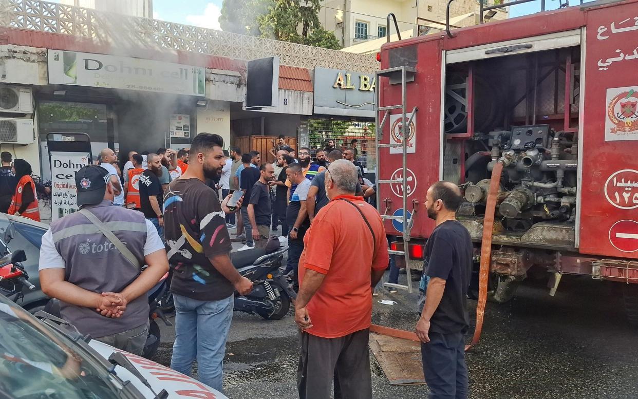 A mobile phone shop in the southern coastal city of Sidon in Lebanon was damaged in the attacks