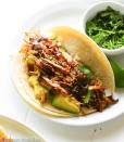 <p>Tender, melt-in-your-mouth pulled pork with crispy edges loaded into a warm corn tortilla—now that’s what we’re talking about! This classic taco from the state of Michoacán takes some time and patience to cook (but you can easily make it in a slow cooker). The pork base can also be used for other dishes, like empanadas or burrito bowls.</p><p><strong>Get the recipe at <a href="https://www.africanbites.com/spicy-pulled-pork/" rel="nofollow noopener" target="_blank" data-ylk="slk:Immaculate Bites;elm:context_link;itc:0;sec:content-canvas" class="link ">Immaculate Bites</a>.</strong></p><p><strong><a class="link " href="https://go.redirectingat.com?id=74968X1596630&url=https%3A%2F%2Fwww.walmart.com%2Fsearch%2F%3Fquery%3Dcitrus%2Bjuicer&sref=https%3A%2F%2Fwww.thepioneerwoman.com%2Ffood-cooking%2Fmeals-menus%2Fg36008054%2Ftypes-of-tacos%2F" rel="nofollow noopener" target="_blank" data-ylk="slk:SHOP CITRUS JUICERS;elm:context_link;itc:0;sec:content-canvas">SHOP CITRUS JUICERS</a><br></strong></p>