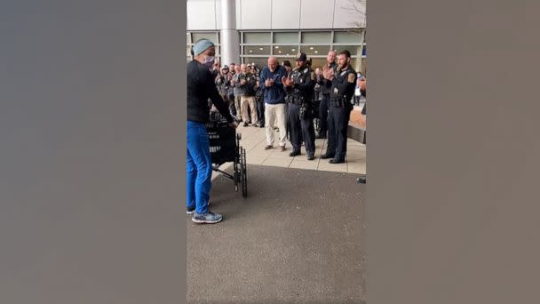 PHOTO: Members of the Bristol Police Department in Connecticut lined up to greet Laura DeMonte and her newborn daughter Penelope as she left a New Haven hospital. (Bristol Connecticut Police Department)