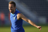 England's Harry Kane takes part in drills during a training session at Al Wakrah Sports Complex on the eve of the group B World Cup soccer match between England and Wales, in Al Wakarah, Qatar, Monday, Nov. 28, 2022. (AP Photo/Abbie Parr)