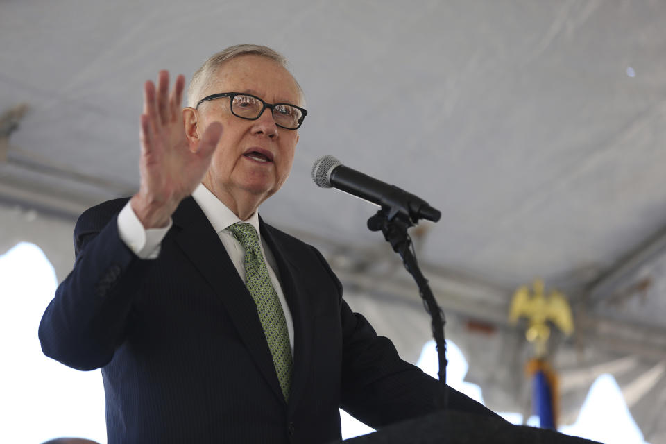 Harry Reid addresses a small crowd at the commissioning of the 179 megawatt (MW) Switch Station 1 and Switch Station 2 Solar Projects north of Las Vegas on Monday, Dec. 11, 2017. (Michael Quine/Las Vegas Review-Journal via AP)