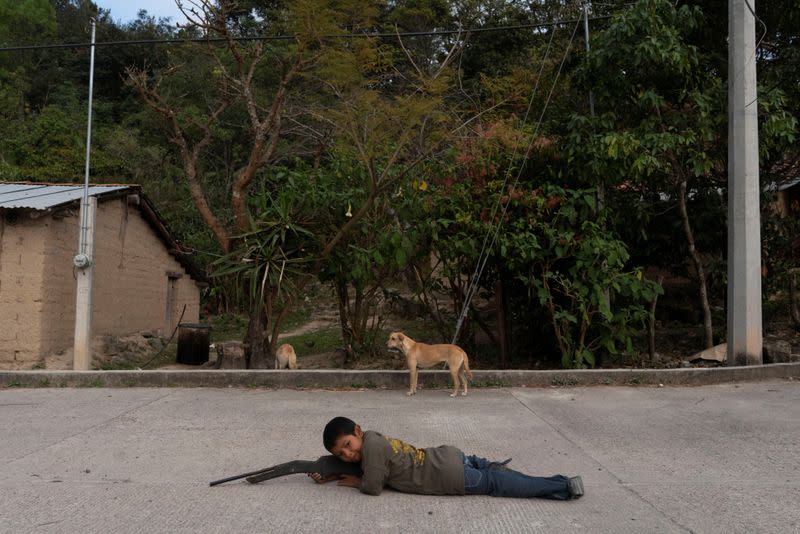 The Wider Image: "Under siege": Inside Mexican village where children are armed