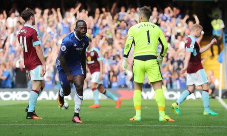 Football Soccer Britain - Chelsea v Burnley - Premier League - Stamford Bridge - 27/8/16 Chelsea's Victor Moses celebrates scoring their third goal as Burnley players look dejected Reuters / Eddie Keogh Livepic