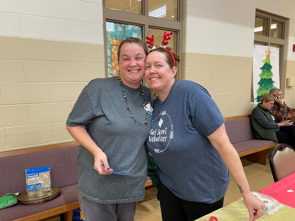 Sherri Simmons and Nicole Berkheimer have Christmas crafts under control at the annual Community Christmas Party Dec. 17, 2023, at Beaver Ridge United Methodist Church.