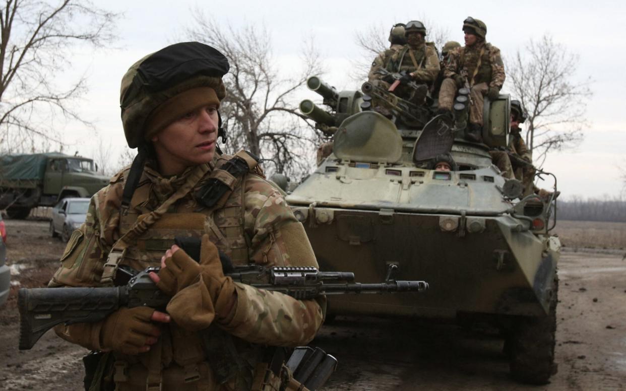 Ukrainian servicemen get ready to repel an attack in Ukraine's Lugansk region - ANATOLII STEPANOV/AFP via Getty Images