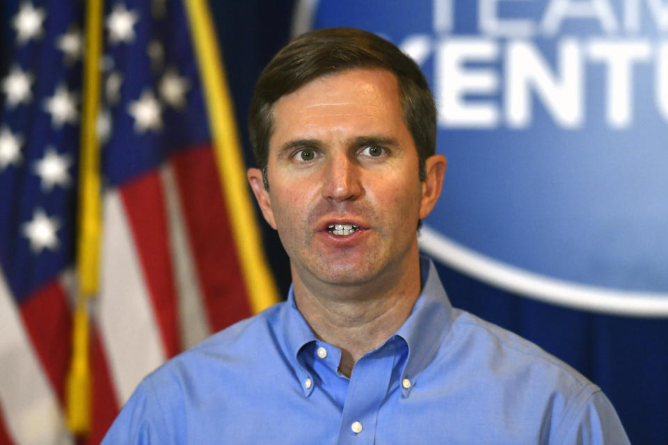 FILE - In this Wednesday, Sept. 23, 2020, file photo, Kentucky Gov. Andy Beshear addresses the media at a news conference at the Kentucky State Capitol in Frankfort, Ky. A Kentucky legislative panel has recommended that no further action be taken on impeachment petitions filed by citizens against Beshear and Attorney General Daniel Cameron. (AP Photo/Timothy D. Easley, File)