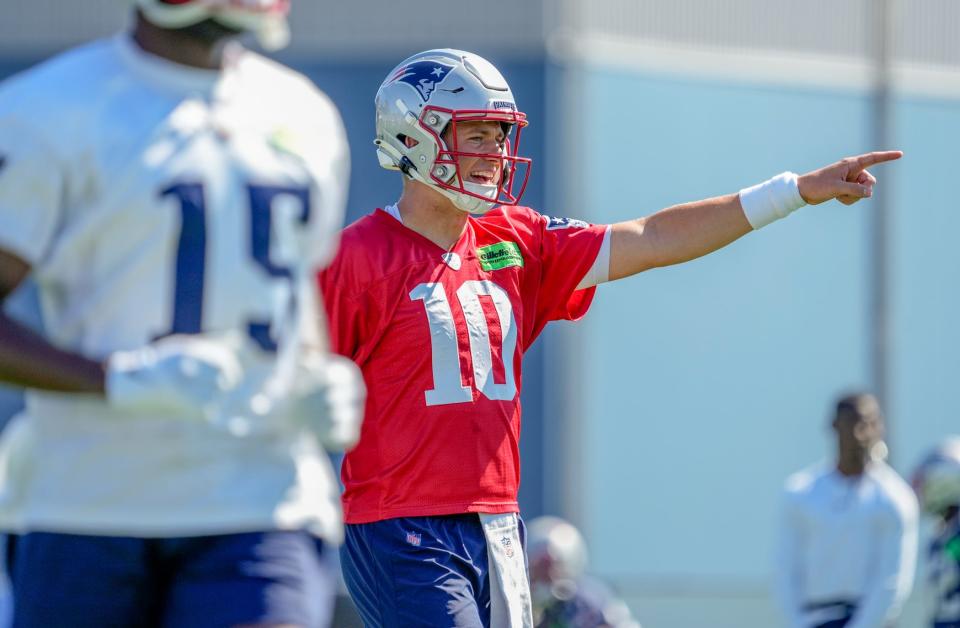 Patriots quarterback Mac Jones directs the offense.