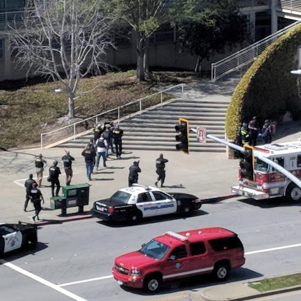 <p>Law enforcement officials react following a possible shooting at the headquarters of YouTube in San Bruno,Calif. on April 3, 2018. (Photo: Graeme Macdonald/Via Reuters) </p>