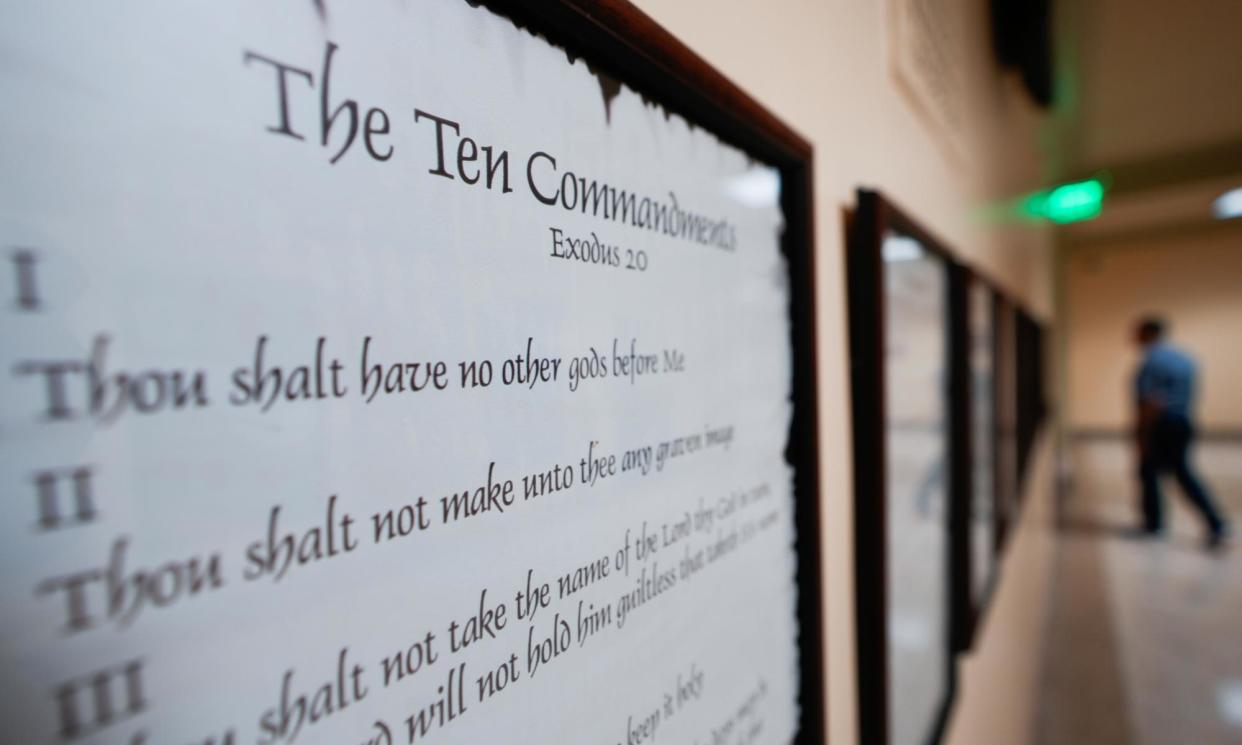 <span>A copy of the Ten Commandments posted in a hallway at the Georgia state capitol building in Atlanta.</span><span>Photograph: John Bazemore/AP</span>