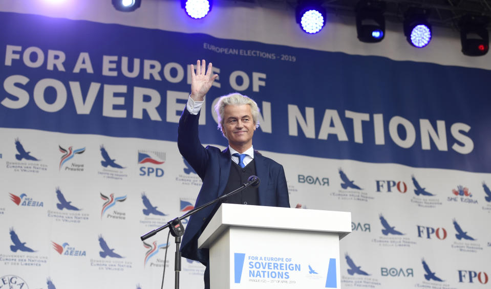 Leader of Dutch Party for Freedom Geert Wilders waves during his speech at a stage during the rally against "dictate of the European Union" organized by Czech far-right Freedom and Direct Democracy party (SPD) in Prague, Czech Republic, Thursday, April 25, 2019. (Michal Kamaryt/CTK via AP)