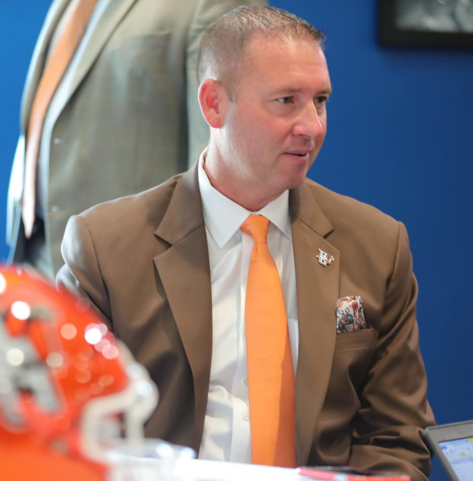 Bowling Green coach Scot Loeffler talks with reporters during MAC media day at Ford Field on Tuesday, July 23, 2019.