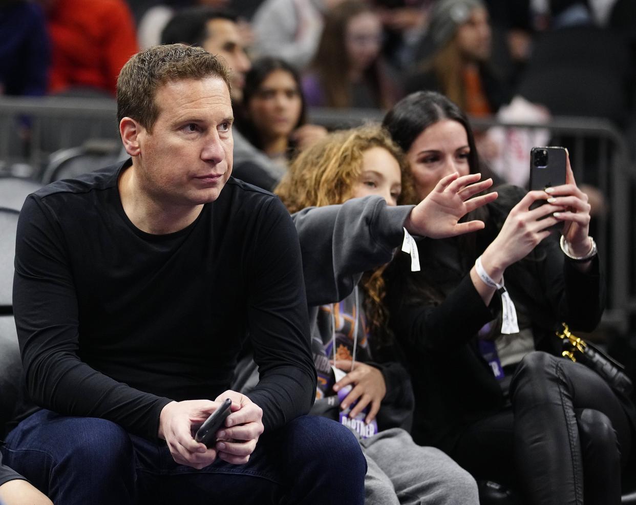 Mat Ishbia watches the Suns warm up prior to a game at Footprint Center in Phoenix on Jan. 21, 2023. Ishbia is waiting on NBA approval to officially become the new team owner.