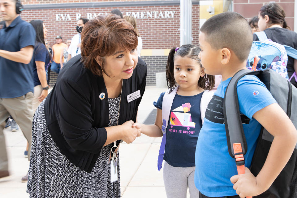 Pueblo D60 Superintendent Charlotte Macaluso meets with Eva R. Baca Elementary School students on the first day of school in 2022.
