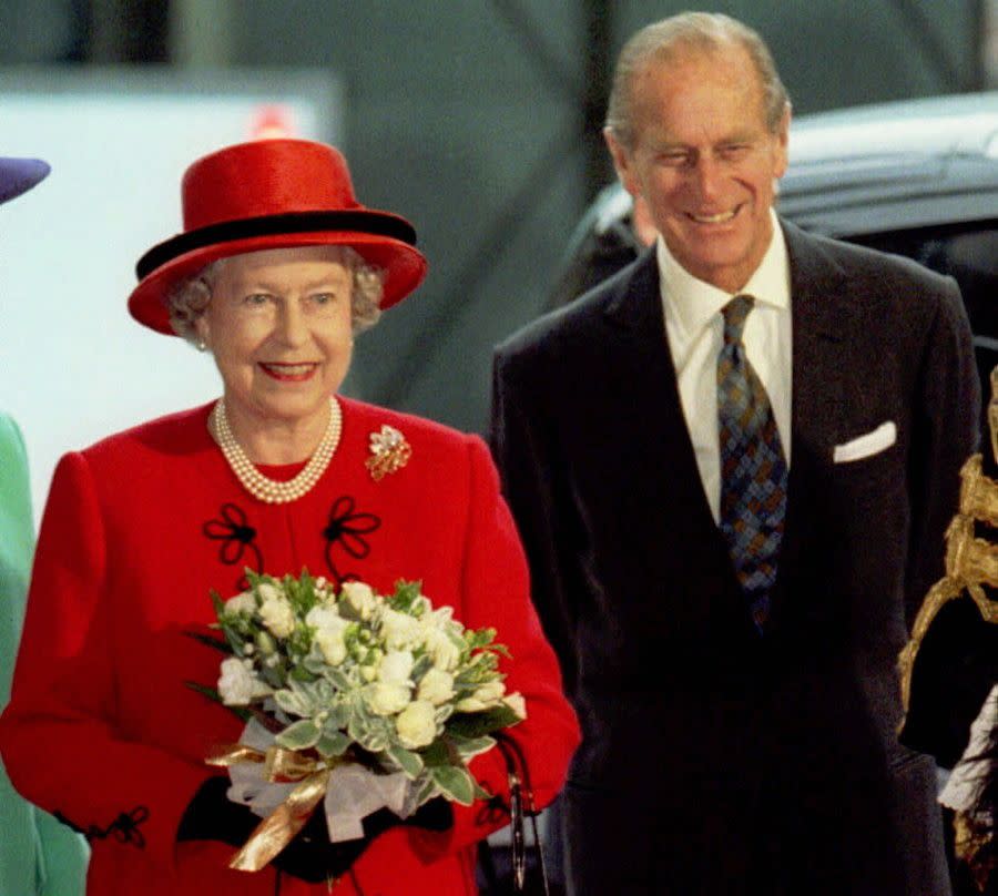 A royal congratulations is in order! After 50 years of marriage, Queen Elizabeth II and Prince Philip, Duke of Edinburgh celebrate their golden anniversary at a luncheon on Nov. 19, 1997.