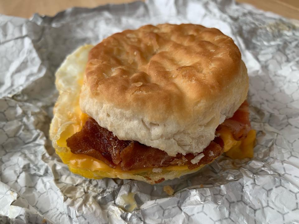 Wendy's bacon, egg, and cheese biscuit on white wrapper