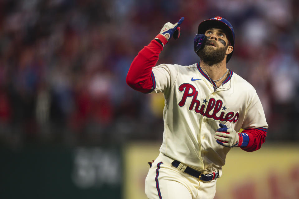 PHILADELPHIA, PENNSYLVANIA - OCTOBER 23: Bryce Harper #3 of the Philadelphia Phillies celebrates as he jogs around the bases after hitting a home run in the eighth inning of Game Five of the National League Championship Series against the San Diego Padres at Citizens Bank Park on October 23, 2022 in Philadelphia, Pennsylvania. (Photo by Matt Thomas/San Diego Padres/Getty Images)