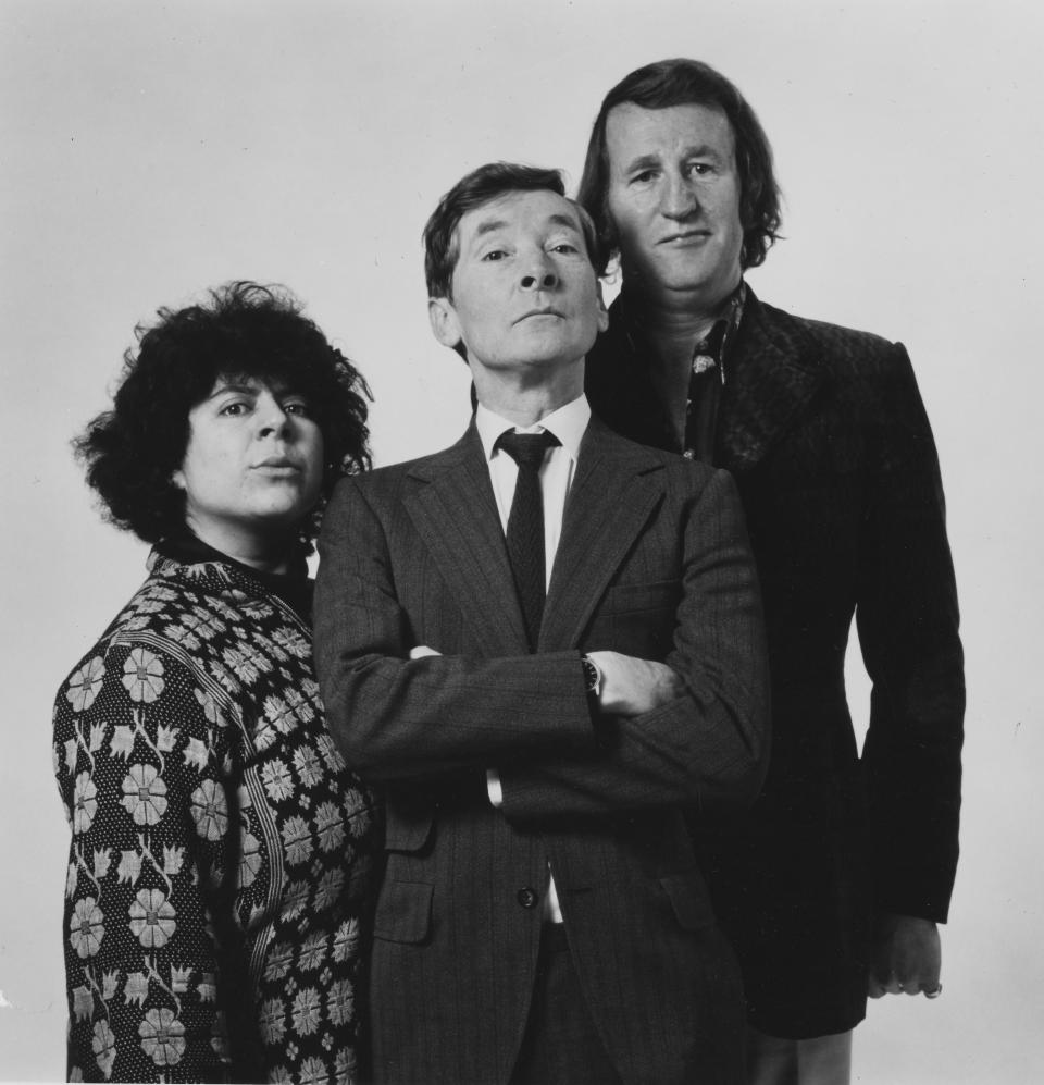 Portrait of comic actors (L-R) Miriam Margolyes, Kenneth Williams and Lance Percival, photographed for Radio Times in connection with the BBC Radio series 'Oh, Get On With It!', 1976. First printed in Radio Times issue 2724, page 4, January 22nd 1976. (Photo by Radio Times/Getty Images)