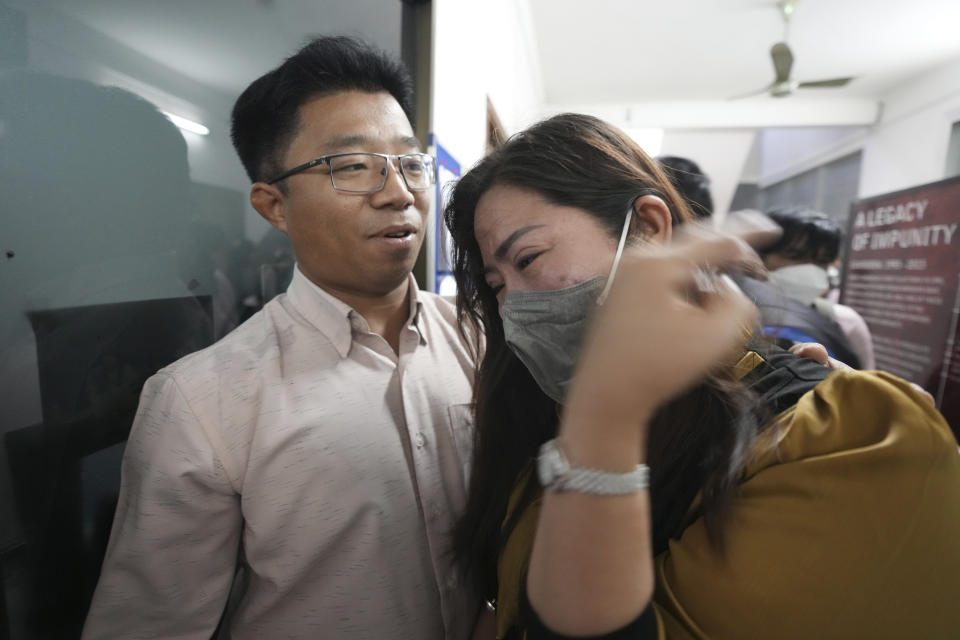 Voice of Democracy, VOD, news coordinator Lim Thida, right, cries at her office in Phnom Penh, Cambodia Monday, Feb. 13, 2023. Cambodia's Prime Minister Hun Sen on Sunday, Feb. 12, ordered one of the handful of independent media broadcasters to shut down for publishing an article he said intentionally slandered his son in connection with the country's relief assistance to earthquake victims in Turkey. (AP Photo/Heng Sinith)