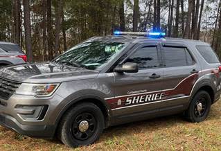 A Cumberland County Sheriff's Office vehicle at the intersection of Batcave Drive and John B Carter Road where a man was found shot, Jan. 1, 2024.