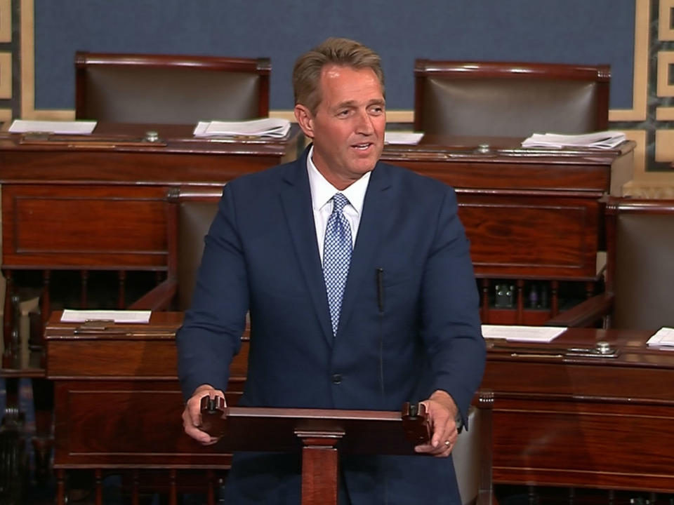 Jeff Flake: Republican senator compares Trump to Stalin... after voting to hand President more spying powers