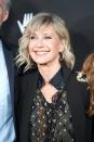 Olivia Newton-John ha ricevuto la prima diagnosi di cancro al seno nel 1992 e la malattia si è ripresentata nel 2013 e nel 2017.