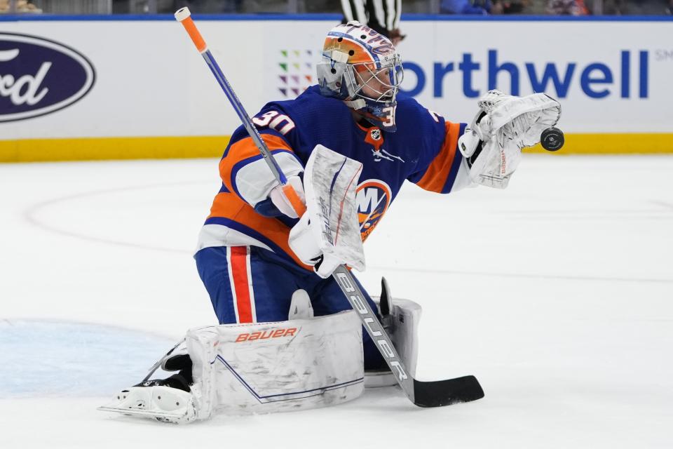 New York Islanders goaltender Ilya Sorokin stops a shot during the first period of the team's NHL hockey game against the Ottawa Senators on Thursday, Oct. 26, 2023, in Elmont, N.Y. (AP Photo/Frank Franklin II)