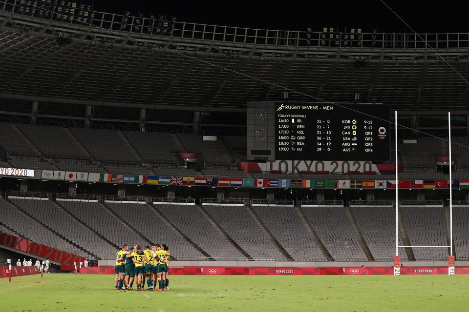 Team Australia huddle after their defeat during the Rugby Sevens Men's Quarter-final match between Australia and Fiji on day four of the Tokyo 2020 Olympic Games