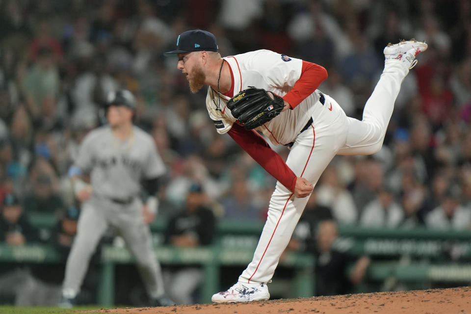 Boston Red Sox pitcher Zack Kelly follows through on a pitch to a New York Yankees batter in the seventh inning of a baseball game, Sunday, June 16, 2024, in Boston. (AP Photo/Steven Senne)