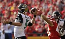 <p>Jacksonville Jaguars quarterback Blake Bortles (5) throws as Kansas City Chiefs defensive back Daniel Sorensen (49) reaches toward him during the first half of an NFL football game in Kansas City, Mo., Sunday, Nov. 6, 2016. (AP Photo/Charlie Riedel) </p>