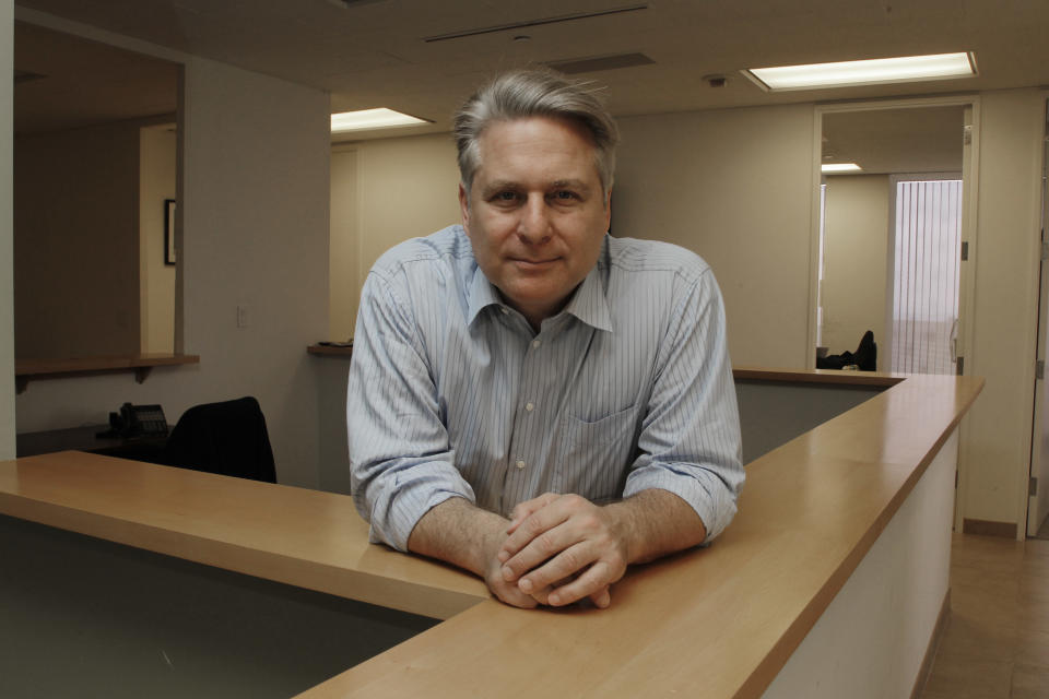 In this Sept. 12, 2012, photo, Joe Fox, CEO of Ditto Trade, poses in his offices in Los Angeles. Ditto Trade is a new online brokerage firm where one can attach their stock portfolio to that of person they trust, so that when they make a trade, so will you. (AP Photo/Reed Saxon)