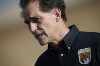 FILE - In this Oct. 5, 2015, file photo, Dan Ashe, then-director of the U.S. Fish and Wildlife Service, talks following an animal release at the Rocky Mountain Arsenal National Wildlife Refuge in Commerce City, Colo. Former U.S. Fish and Wildlife Service Director Ashe told The Associated Press that the Migratory Bird Treaty Act's threat of prosecution served as "a brake on industry" that had saved probably billions of birds. (AP Photo/David Zalubowski, File)