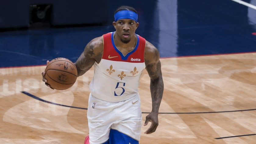 New Orleans Pelicans guard Eric Bledsoe (5) drives with the ball against the Los Angeles Lakers in the third quarter of an NBA basketball game in New Orleans, Sunday, May 16, 2021. (AP Photo/Derick Hingle)